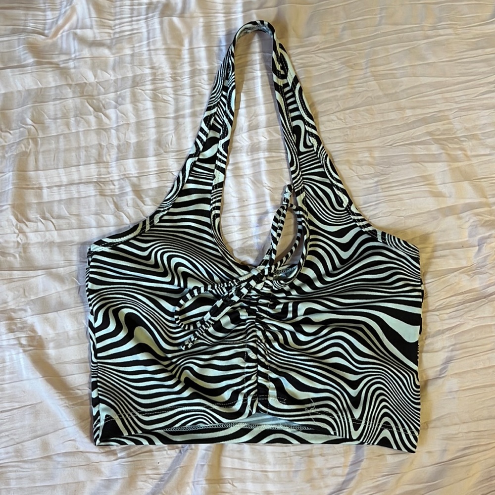 Cropped going out top